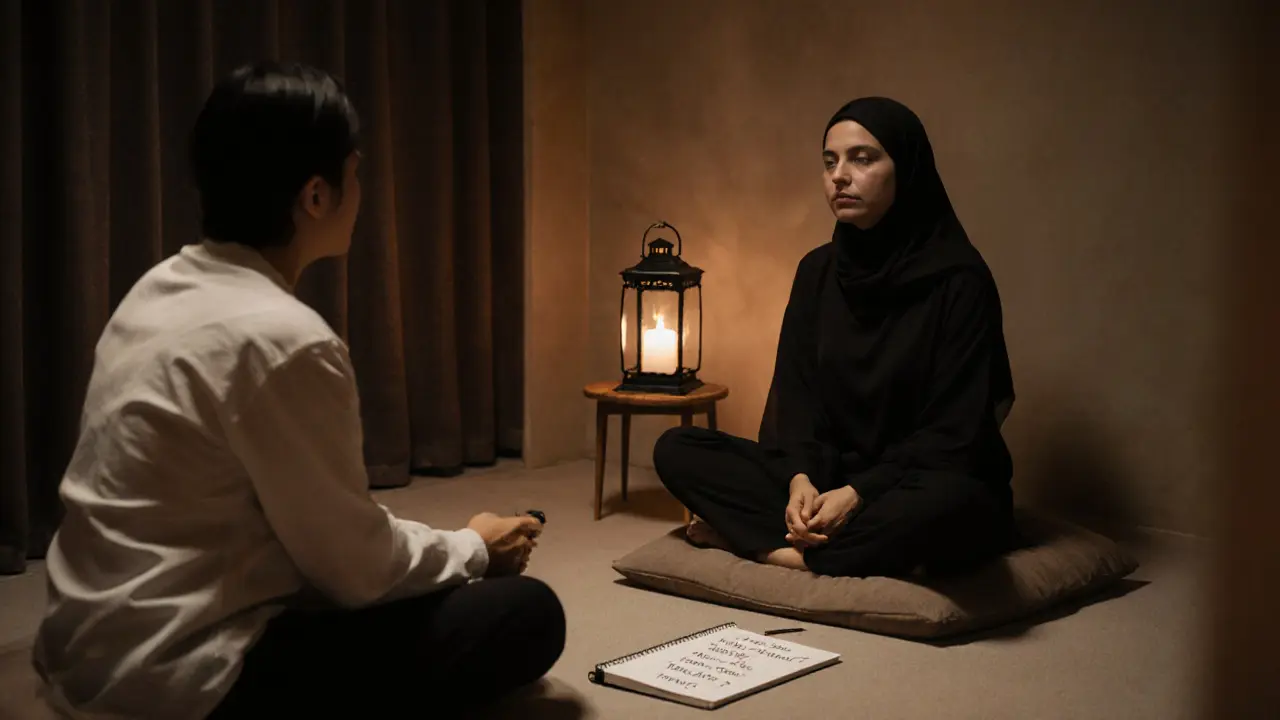 A spa practitioner and client sitting quietly together, sharing a moment of trust before a massage begins.